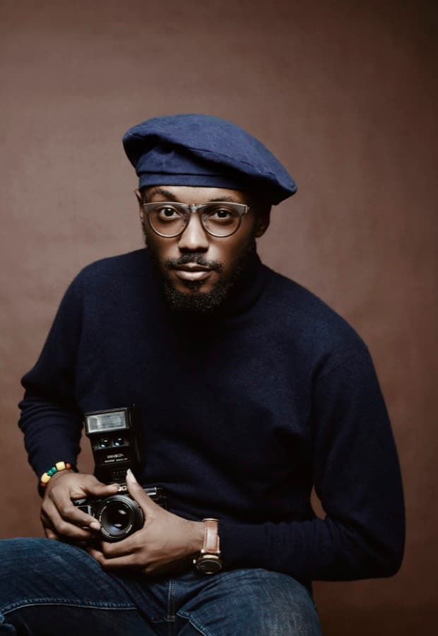 Photographe avec son appareil